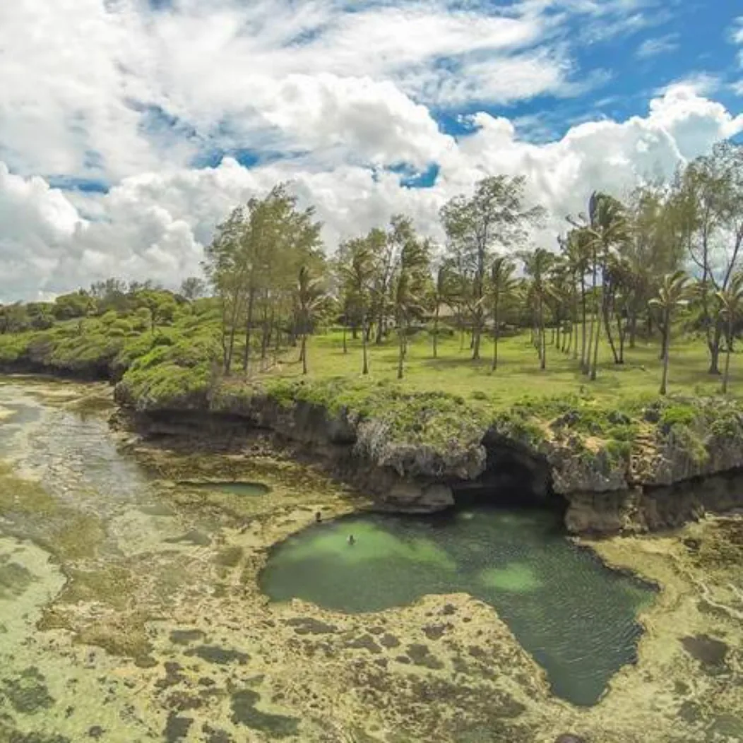 Natural rock pool at Tiwi Beach