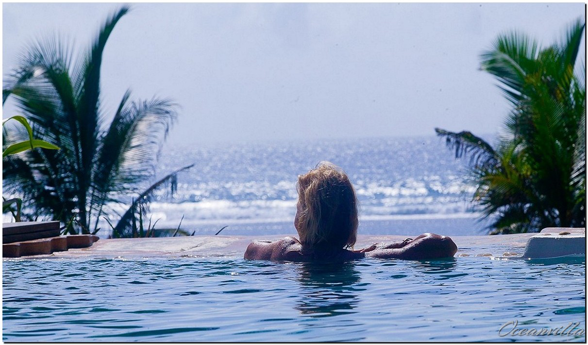 Sabine in the villa pool overlooking the Indian Ocean